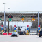 Point payment of travel on toll road with riding vehicles