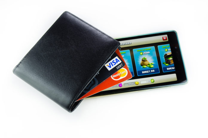 Credit card and phone isolated on white background